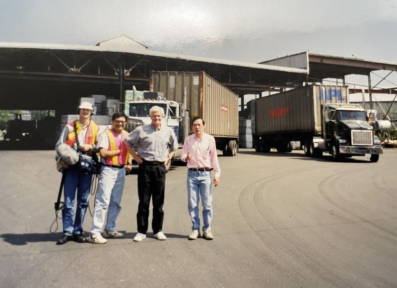 Paul Lo (right) with a film crew at Canaan Group’s first warehouse at 275 West 1st Ave